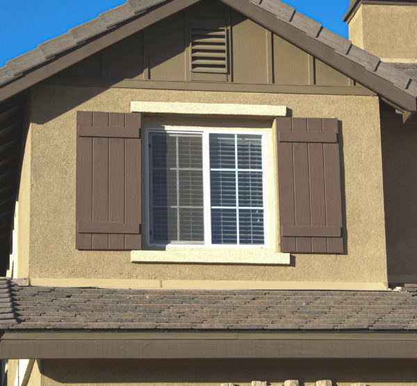 faux wood shutters on the exterior of a home