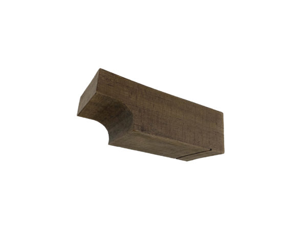 5¼" x 4" x 11⅞" Rough Sawn cove faux wood corbel manufactured and sold by Volterra Architectural Products.