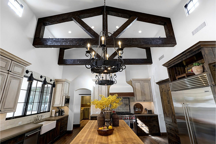An image of Volterra’s faux wood beams installed in a kitchen.