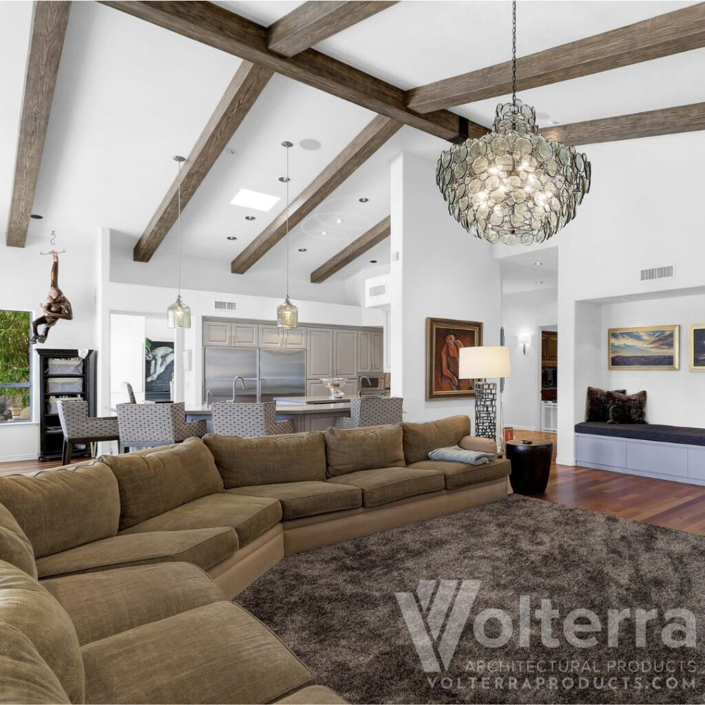 living room with faux wood beams