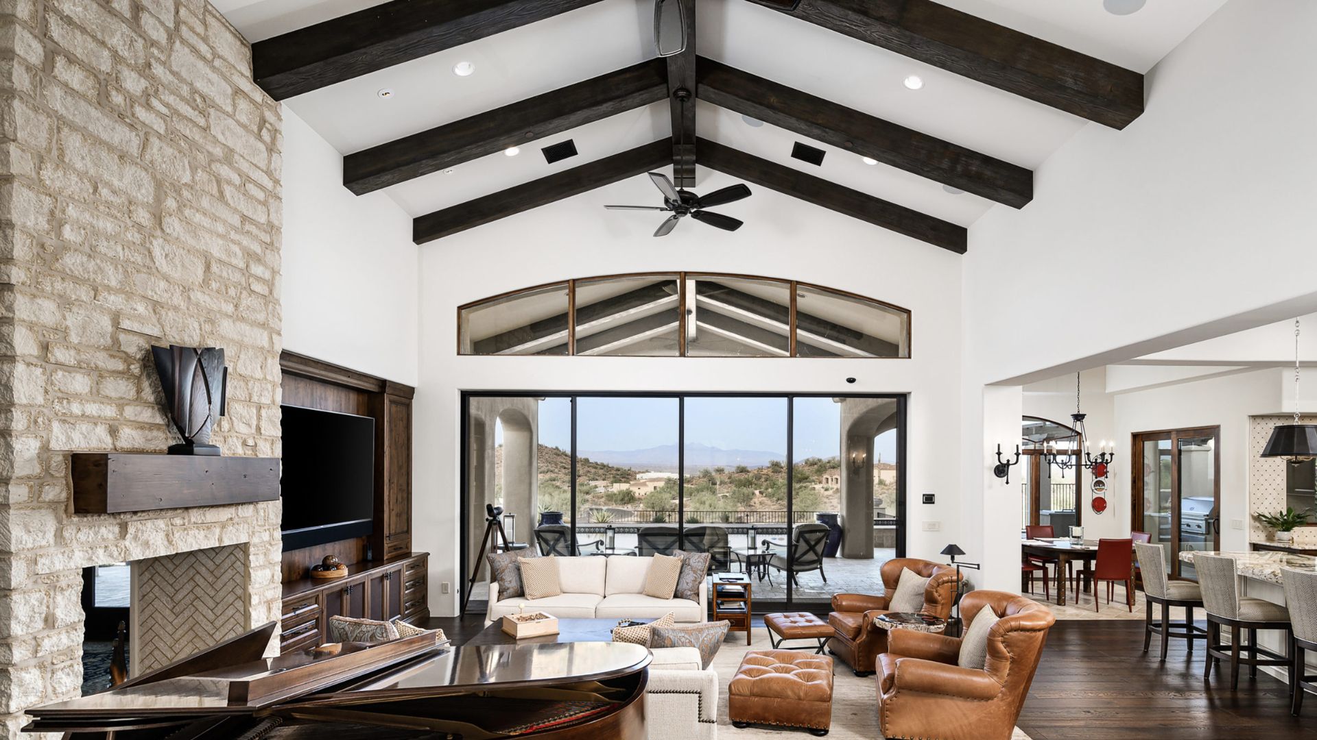grand living room with faux wood beams